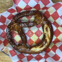 Hot Buttered Pretzel · Baked pretzel served with a side of beer cheese and spicy hot mustard.