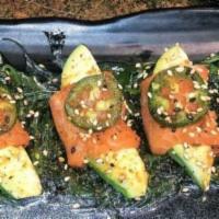 Salmon Avocado · Six pieces salmon sashimi, seaweed salad, avocado, and honey jalapeño ponzu sauce.