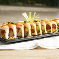 Gambler Roll · Spicy tuna, shrimp tempura, avocado, cucumber, topped with spicy yellowtail, scallions, garl...