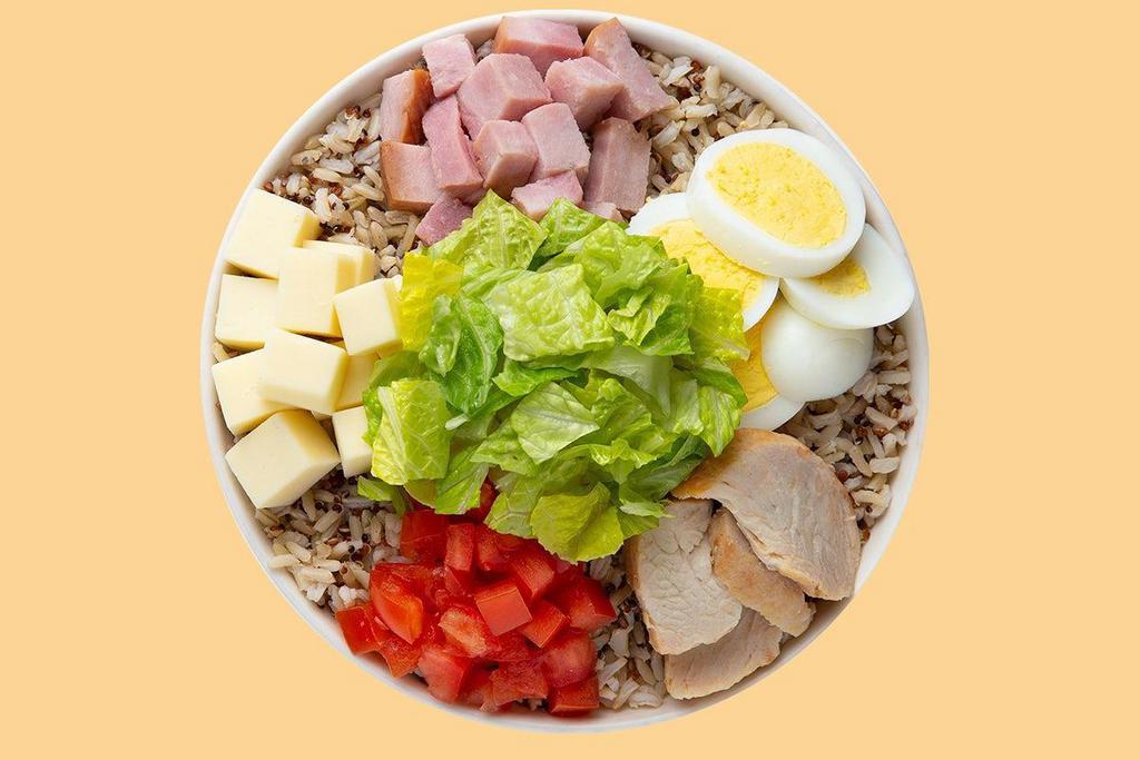 Bently Warm Grain Bowl · Our Chef starts with a base Super Grains Blend. It is served with Smoked Ham, Roasted Turkey, Provolone Cheese, Sliced Egg and Diced Tomatoes. We recommend our Green Goddess dressing.