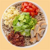 Roasted Turkey Club Warm Grain Bowl · Our Roasted Turkey Club starts with a Super Grains base and Radiatore Pasta. It is served wi...