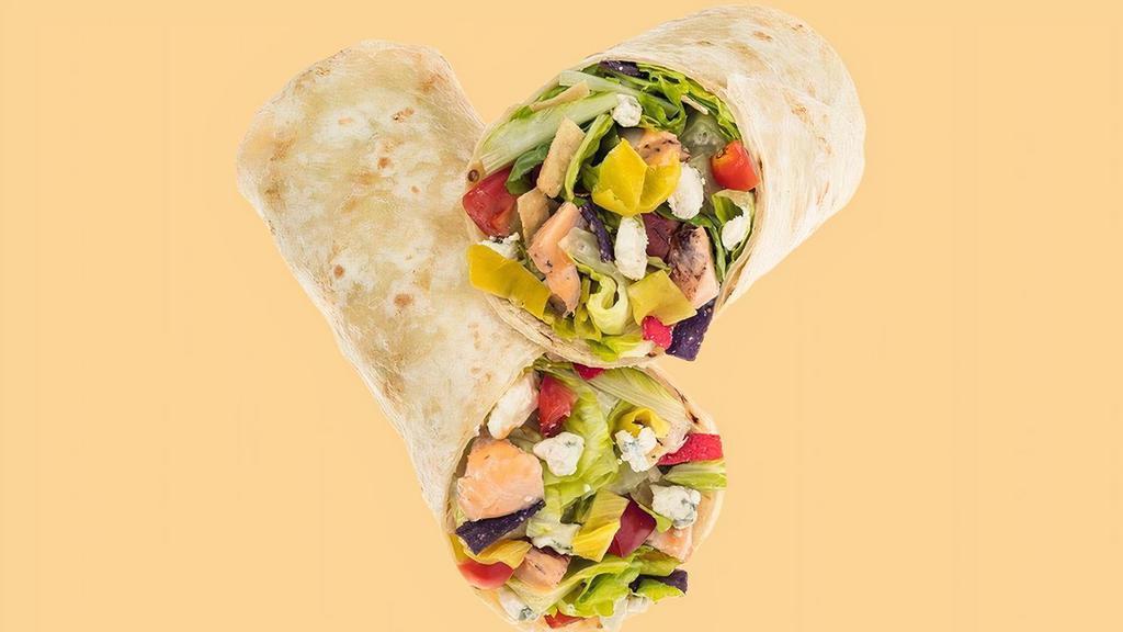 Buffalo Bleu Wrap · Our Chef recommends a base of our Romaine/Iceberg Blend. It's served with Grilled Buffalo Chicken, Diced Tomatoes, Sliced Banana Peppers, Bleu Cheese and Tri-Color Tortilla Strips. We recommend our Creamy Bleu Cheese dressing.