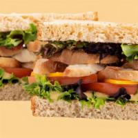 Turkey 'N Cheddar Sandwich · Sink your teeth into this . . . Chomp! This sandwich features mounds of juicy Roasted Turkey...