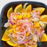 Mango Habañero Aguachile · diced shrimp and mango, red onion, orange slices, all in a spicy, citrusy marinade. Served w...