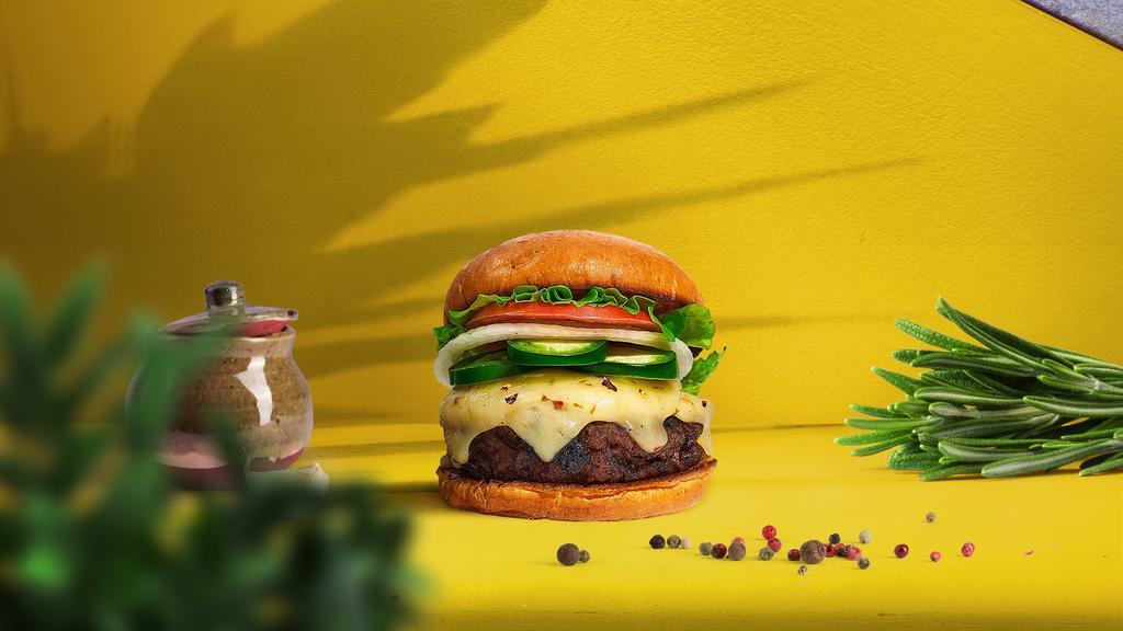 Give Me A Peno Burger · Seasoned Beyond meat patty topped with melted vegan cheese, jalapenos, lettuce, tomato, onion, and pickles. Served on a bun.