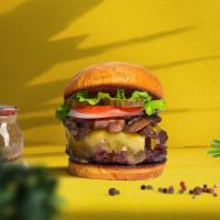 Get A  Room Burger · Seasoned Beyond meat patty topped with mushrooms, melted vegan cheese, lettuce, tomato, onio...