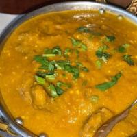 Lamb Curry · Boneless lamb specially herbs and tasty spices cooked with ginger, garlic.