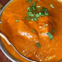 Chicken Curry · Chicken cooked in a light gravy, mild or hot.