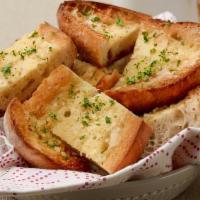 Garlic Bread · house-made focaccia bread, garlic butter, grated parmesan