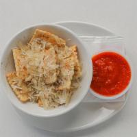 Fried Cheese Ravioli. · Lightly breaded & served with homemade tomato sauce
