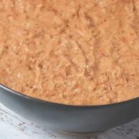 Large Frijoles Refritos · Refried beans