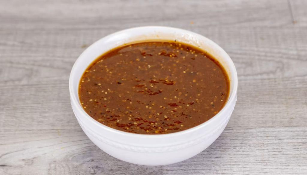 Medium Salsa Tomatillo Chipotle · Smoky chipotle blended with fire roasted tomatillo, and savory garlic.