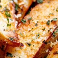Potato Wedges · Baked potatoes with garlic, dill, paprika, pepper, salt and oil