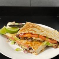 Quesadillas · Choice of meat. lettuce, tomato, onions, cilantro, cheese, and sauce.