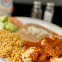 Camarones Ala Diabla · Shrimp in hot sauce serve w/ rice and beans and tortillas.