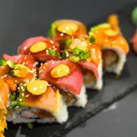 Tamasii Fusion Roll * · (Spicy Tuna, Immitation Crab, D.F. Shrimp) Avocado, Tuna, Salmon, Albacore, Tobiko, Onion, S...