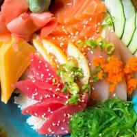 Chirashi  · 12 pieces chef's choice of variety of  fresh fish scatter over Sushi rice with Wakami Salad,...