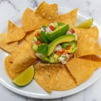 Ceviche Tower · Gluten-Free. Shrimp marinated in a fresh lime juice. Diced: Avocado, cucumber, tomato, jalap...