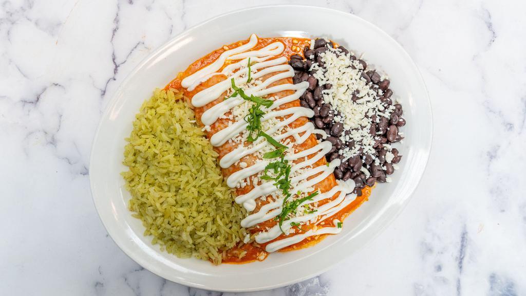 Two Enchiladas · Gluten-Free. Green or Red Sauce. Filled with your choice of cheese or chicken. Covered with melted Jack, crema, Queso Fresco, and cilantro.
