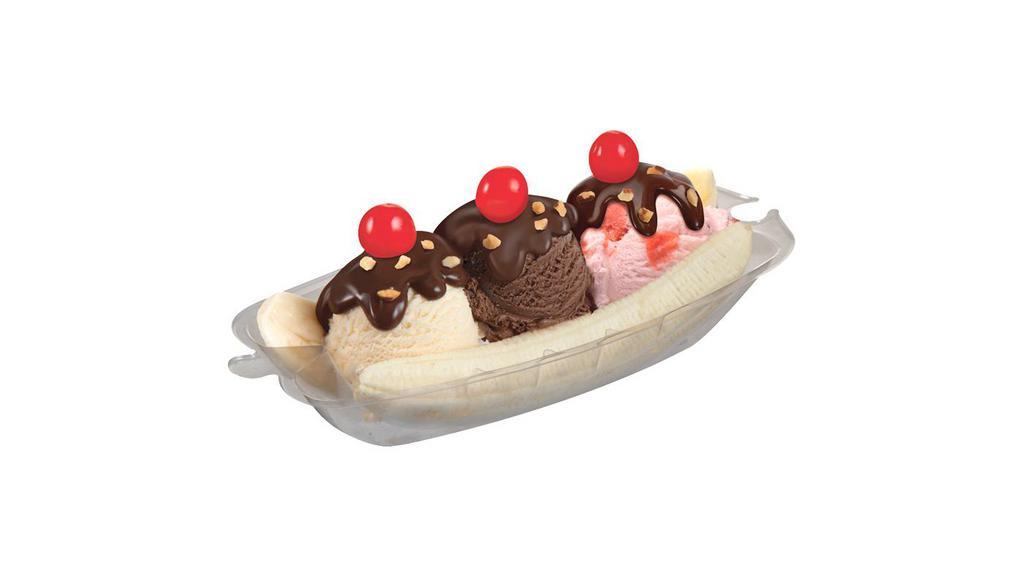Banana Split · Three of your favorite ice cream flavors, two banana slices, your choice of wet topping, all crowned with chopped almonds, and three cherries.