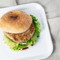 Ground Turkey Burger · Lettuce, tomato, onion, pickle, and Thousand island served on a bun.