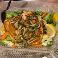 Grilled Stuffed Salmon Filet · Grilled salmon filet stuffed with crab meat and baby shrimp sauteéd with onion and cilantro,...