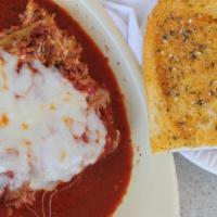 Lasagna (Meat & Ricotta) · Fresh beef, ground sausage, special prepared ricotta cheese, our own homemade sauce and topp...