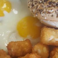 The Signature Breakfast · two farm eggs any style with choice of meat, choice of toast and choice of side