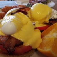 Blackstone Benedict · with crumbled honey cured bacon and tomato on brioche toast