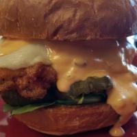 Fried Chicken Sandwiches · buttermilk fried chicken breast, Swiss cheese, organic green, pickles and thousand island on...