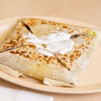 Super Switzerland Quesadilla · Large flour tortilla, cheese, your choice of meat, guacamole, sour cream, lettuce, and pico ...