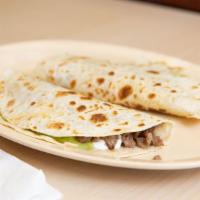 Super Quesadilla · Flour tortilla, cheese, your choice of meat, guacamole and sour cream.