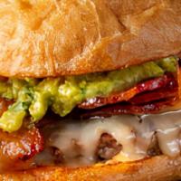 Brookfields Gourmet Guacamole Burger · Flavored with chipotle mayonnaise and topped with guacamole, bacon, and pepper jack cheese. ...