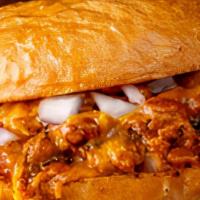 Chili Burger · Our chili burger is topped with our homemade chili con carne, melted cheddar cheese, and dic...