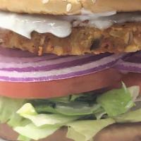 Veggie Burger · Vegan friendly burger with lettuce, tomato, onion, pickle , house sauce