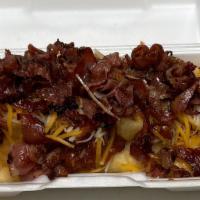 Chilli Cheese Pastrami Fries · Deep- fried crinkle cut fries topped with hot chilli, cheese, and pastrami