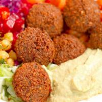 Falafel · Vegan, gluten-free. A mixture of freshly ground chickpeas, fresh herbs and Middle Eastern sp...