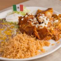 Chilaquiles · Eggs served your way, tortillas with our special sauce topped with cheese.