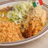 Huevos Rancheros · Two large eggs over easy served on a corn tortilla topped with ranchera sauce and melted che...