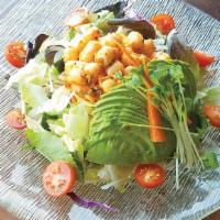 Spicy Scallop Salad · Spicy scallop and cucumbers on top of greens.