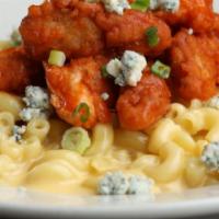 Buffalo Mac · Traditional mac and cheese, spicy buffalo chicken breast, blue cheese crumbles and green oni...