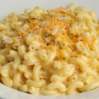 Classic Mac · Traditional mac and cheese, shredded cheese and parsley.