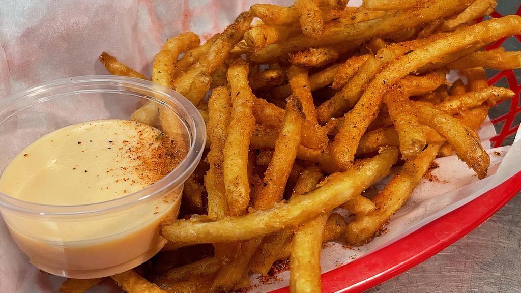 Cajun Fries · Crispy coated skinny cajun seasoning french fries.