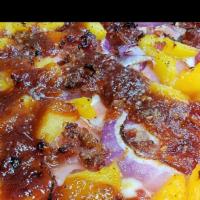 Hawaiian Delight · Canadian bacon, pineapple tidbits, bacon, red onions and fresh garlic over our pizza sauce w...