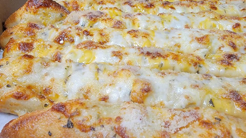 Three Cheese Italiano · Garlic butter, Italiano spices, fresh garlic, asiago cheese, cheddar cheese, mozzarella, and parmesan cheese.