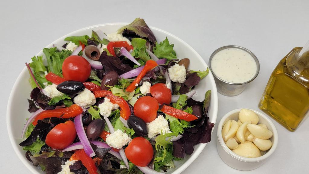 Mediterranean Salad Single · Green mix, red roasted peppers, cherry tomatoes, red onions, and feta cheese.