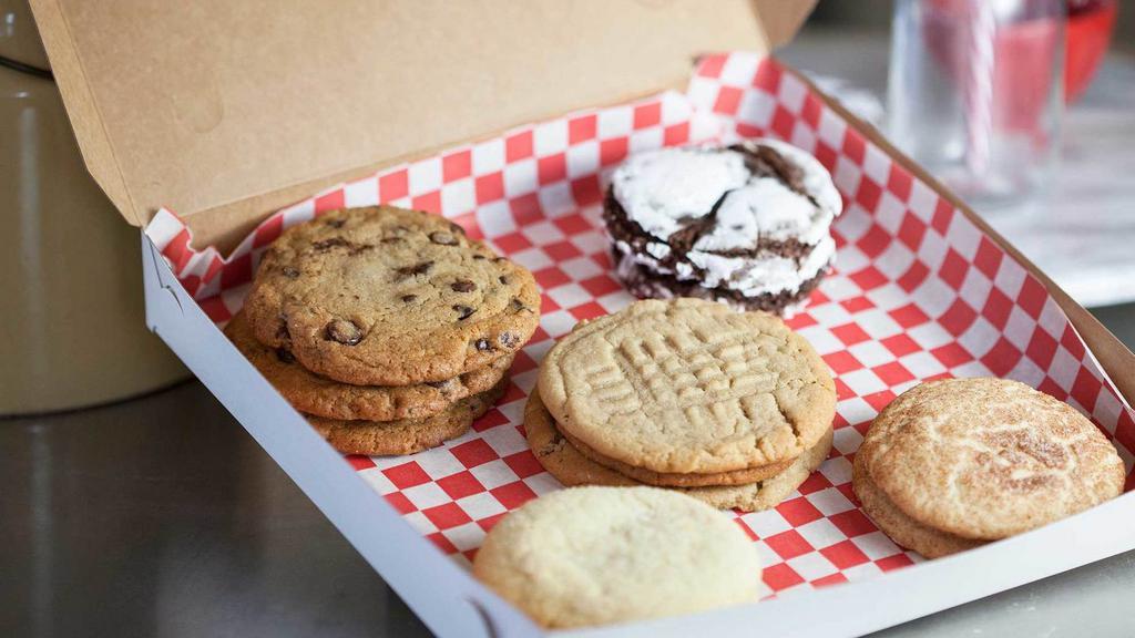 Assorted Dozen (12 Cookies) · An assortment of our six cookie flavors, including the rotating special of the week. Check our Instagram @CookiesAndMilkSac to see this week's special). No substitutions.