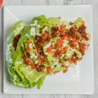 Wedge Salad · Crispie bacon, tomato, feta cheese &choice of ranch or blue cheese.