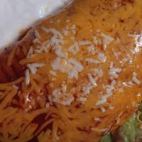 Super Burrito · Carne asada, carnitas, or adobada. Rice, beans, sour cream, cheese, guacamole, and pico de g...