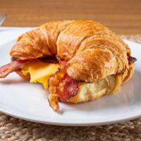 Croissant · Eggs with the choice of bacon, ham or sausage, American cheese and mayo.